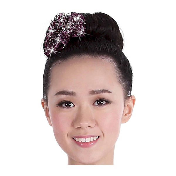 Woman with decorative hairpiece on a white background