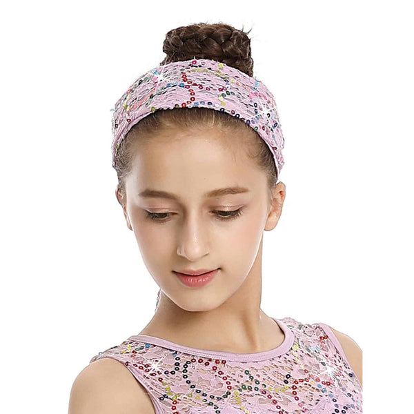 Young girl wearing a lilac floral headband and matching outfit on a white background
