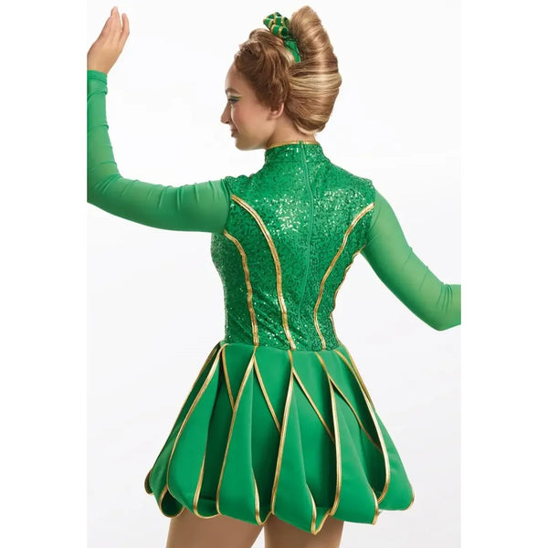 A woman modeling a green tinkerbell-style costume from the back, featuring a sequined bodice with gold trim, long green sleeves, and a pleated skirt with gold edging, against a plain white background.